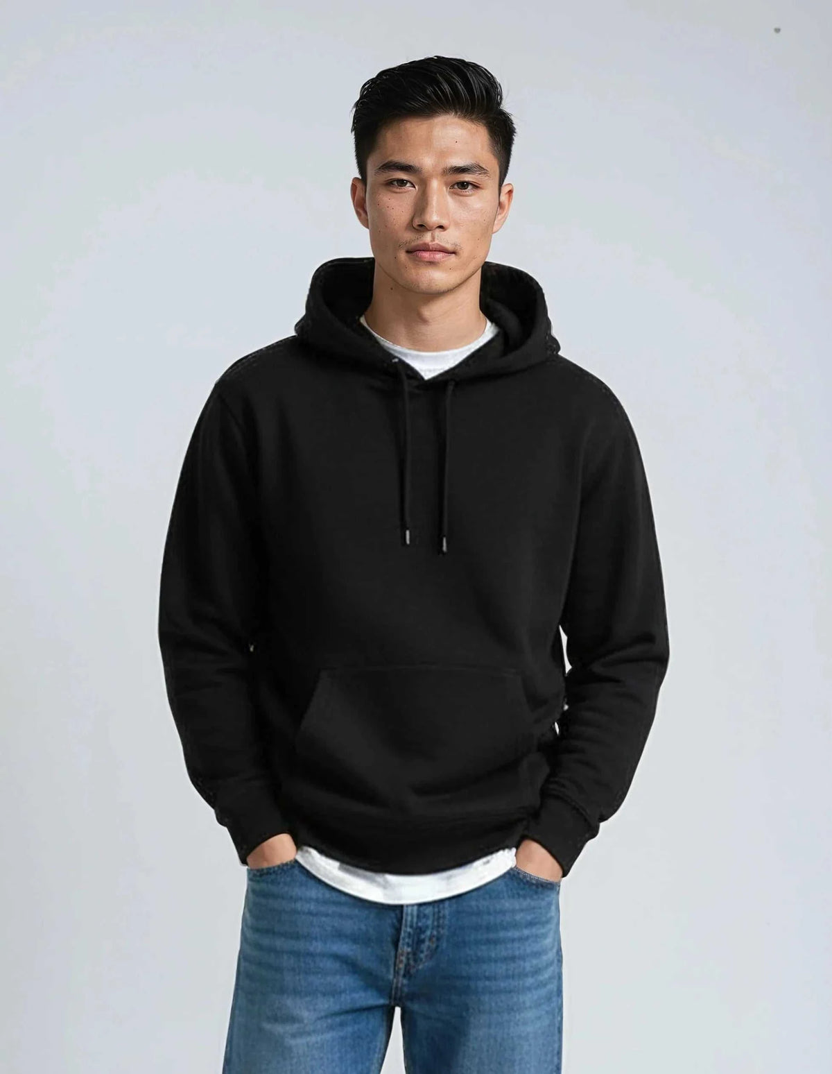 Heavyweight hoodie pullover in cotton-polyester blend with durable seams and ribbed cuffs for warmth and comfort